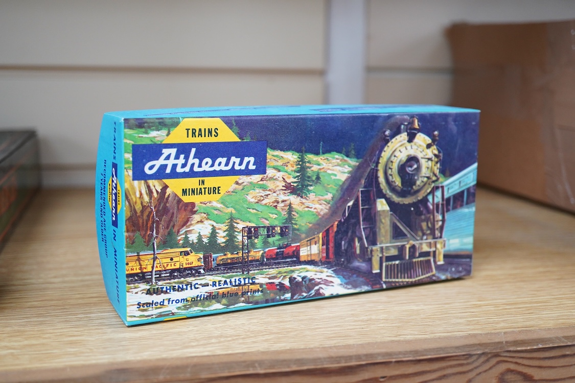 A quantity of US outline HO railway by Athearn, Bachmann, etc. including three locomotives; a Union Pacific Bo-Bo diesel, 1468, a Santa Fe Bo-Bo diesel, 5707, and a Santa Fe 0-4-0 tender engine, together with a 12-wheel